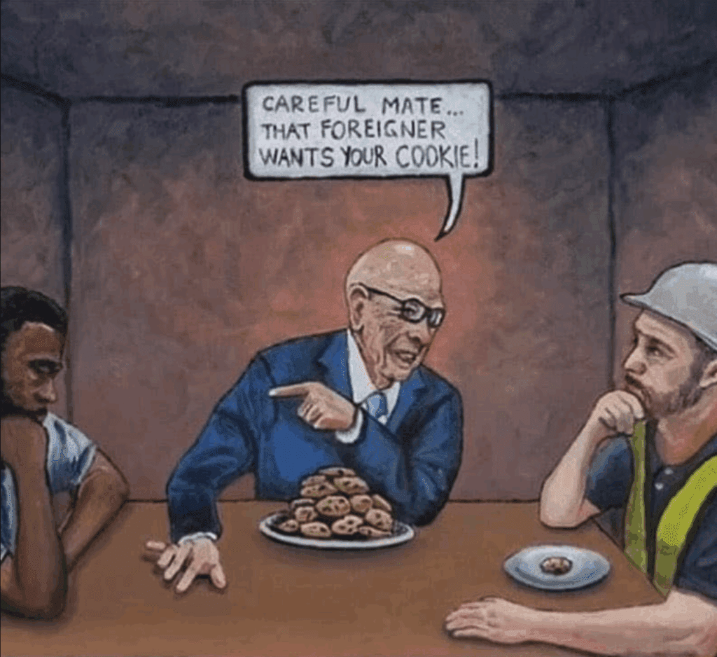 Artist unknown; image widely circulated in economic justice communities. Man with huge pile of cookies tells white man with one cookie "careful mate… That foreigner wants your cookie" pointing at brown man.